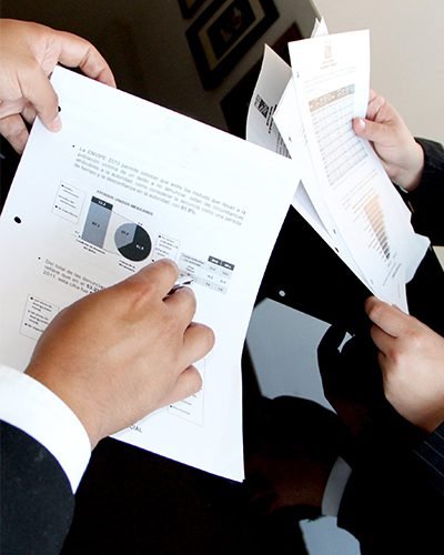 Hands holding papers